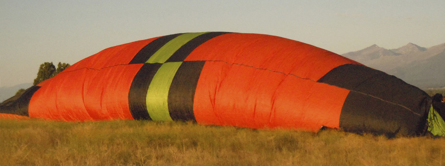 the 'LadyBug' hot-air balloon starting to inflate in the Bitterroot Valley of Western Montana, near Stevensville, Montana, south of Missoula.