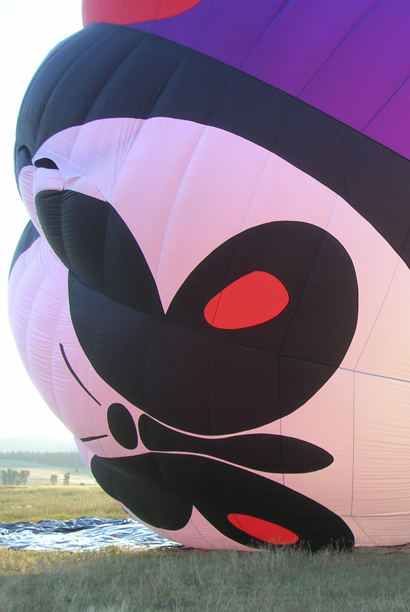 the nearly inflated hot-air balloon, 'Mountain Butterfly', on her Maiden Voyage from the Greenough area in Western Montana. the nearly inflated hot-air balloon, 'Mountain Butterfly', on her Maiden Voyage from the Greenough area in Western Montana.